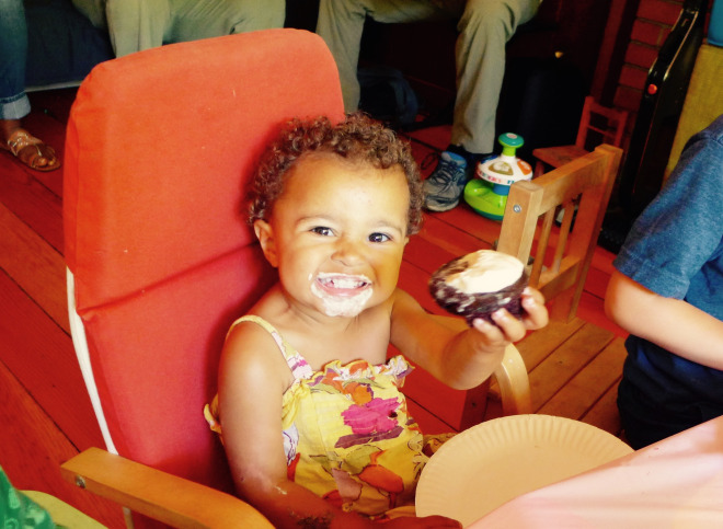 Kira-Satya, My 21 month old daughter, enjoying a cupcake.